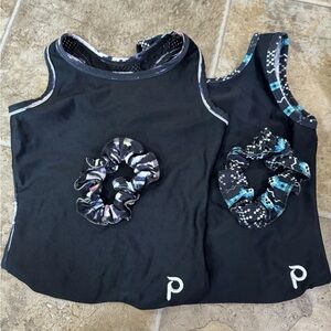 2 Plum leotards (child medium)